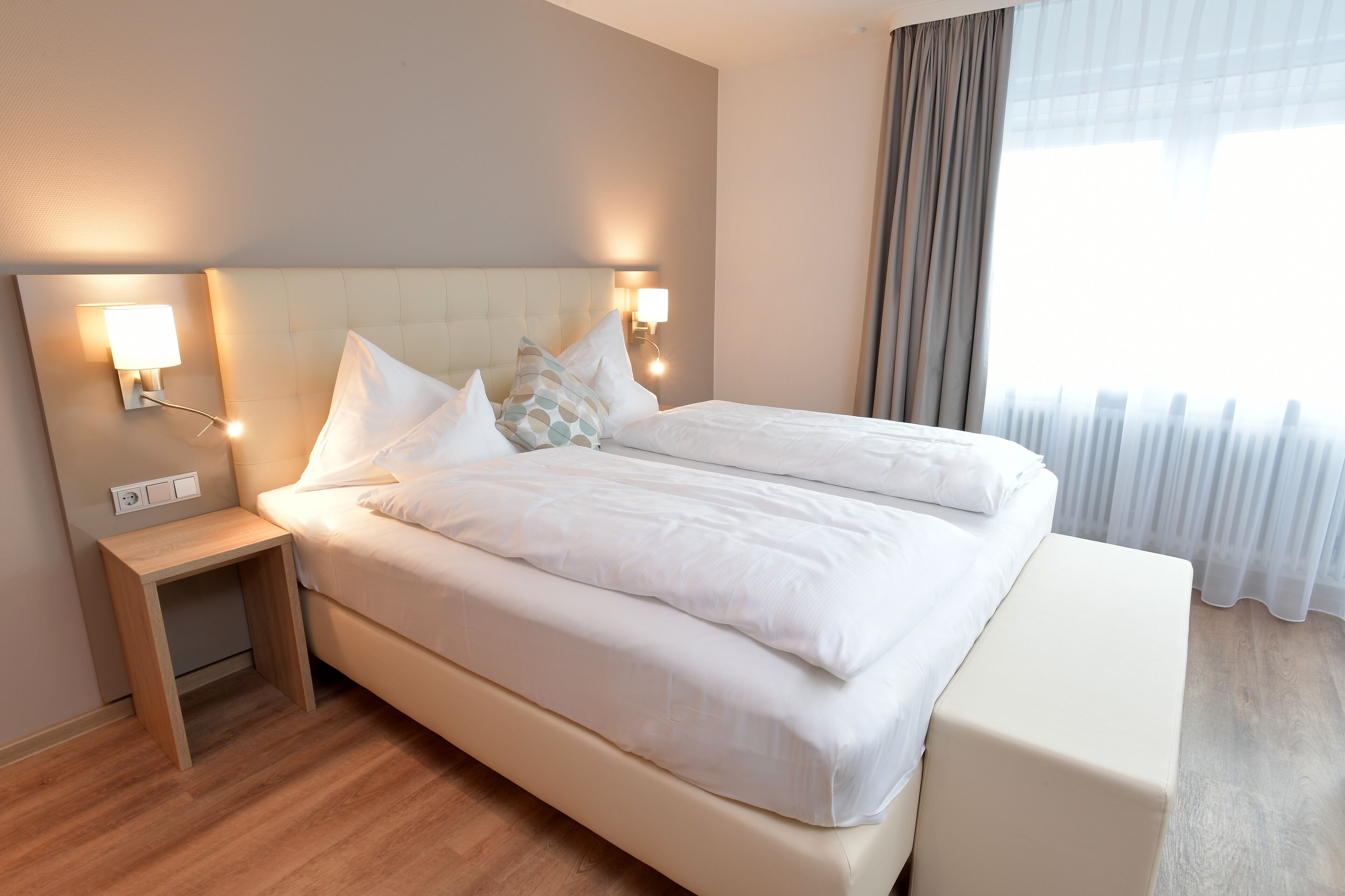 deluxe double room | minibar, in-room safe, desk, blackout curtains