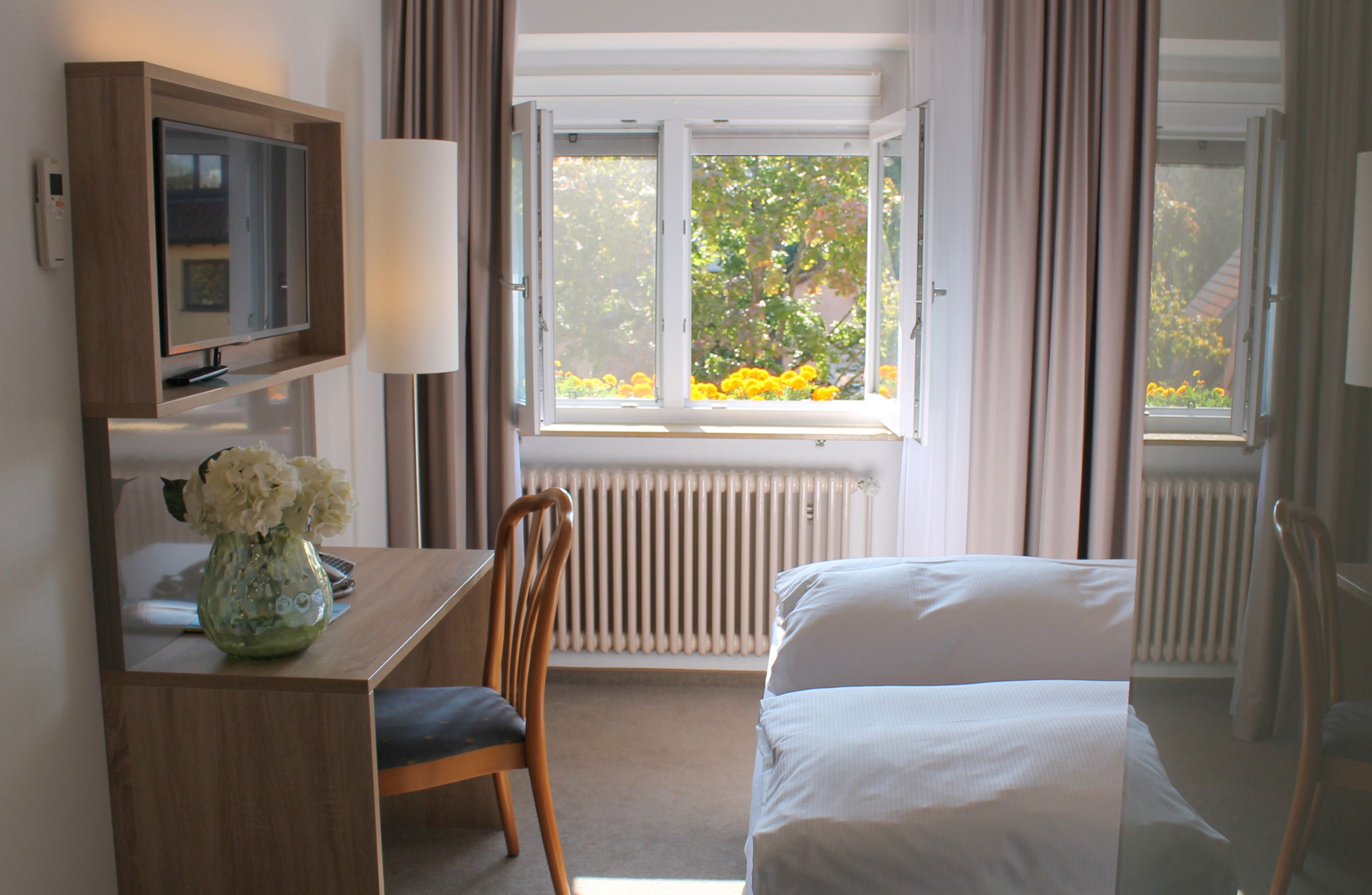 business double room | minibar, in-room safe, desk, blackout curtains