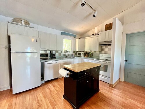 Waterfront Retreat with Sunset Views & Sandy Beach