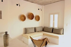 Family Suite, 1 Bedroom, Hot Tub | Living area | 42-inch flat-screen TV with satellite channels, TV - Mesanto Luxury Suites (Santorini)