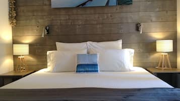 Cottage, 1 Bedroom, Pool View | 1 bedroom, individually decorated, individually furnished, desk