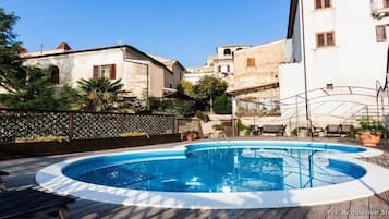 Outdoor pool, pool umbrellas, pool loungers