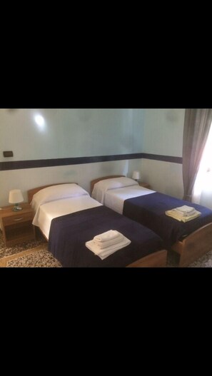 Desk, rollaway beds, free WiFi, bed sheets