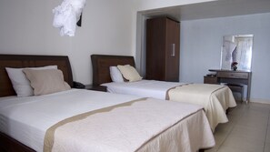 Twin Room, Non Smoking, Bay View | Blackout drapes, free WiFi, bed sheets - Océanis Hotel (Mutsamudu)