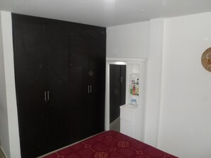 مكواة/لوح كي وملاءات أسرّة