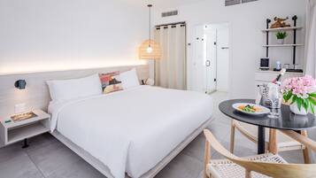 Premium bedding, pillow-top beds, minibar, in-room safe