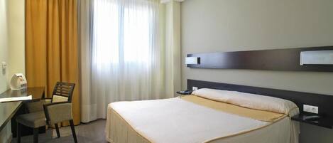 In-room safe, desk, laptop workspace, blackout curtains