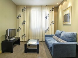 48-inch flat-screen TV with satellite channels, TV