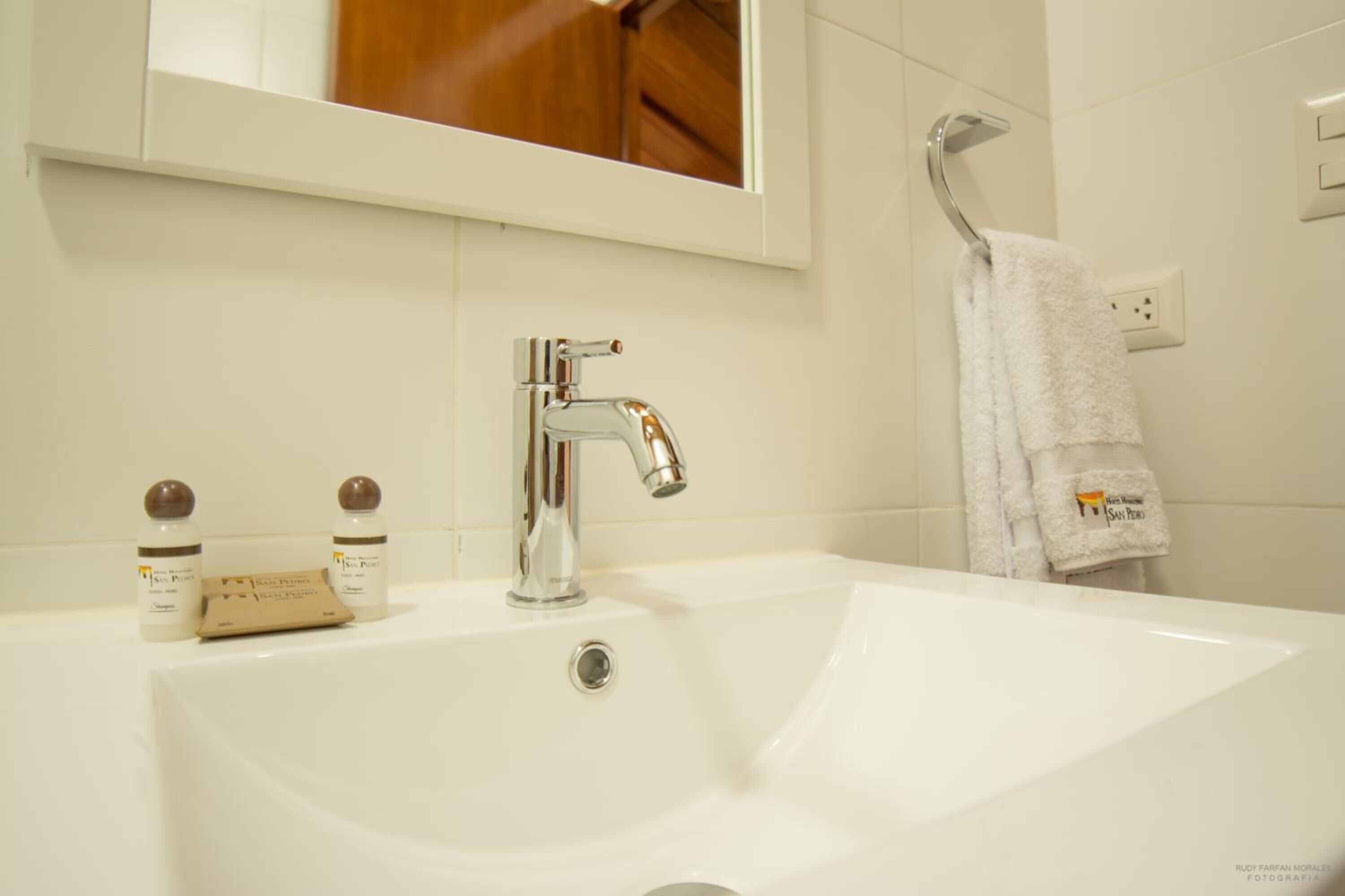 shower, free toiletries, bathrobes, towels