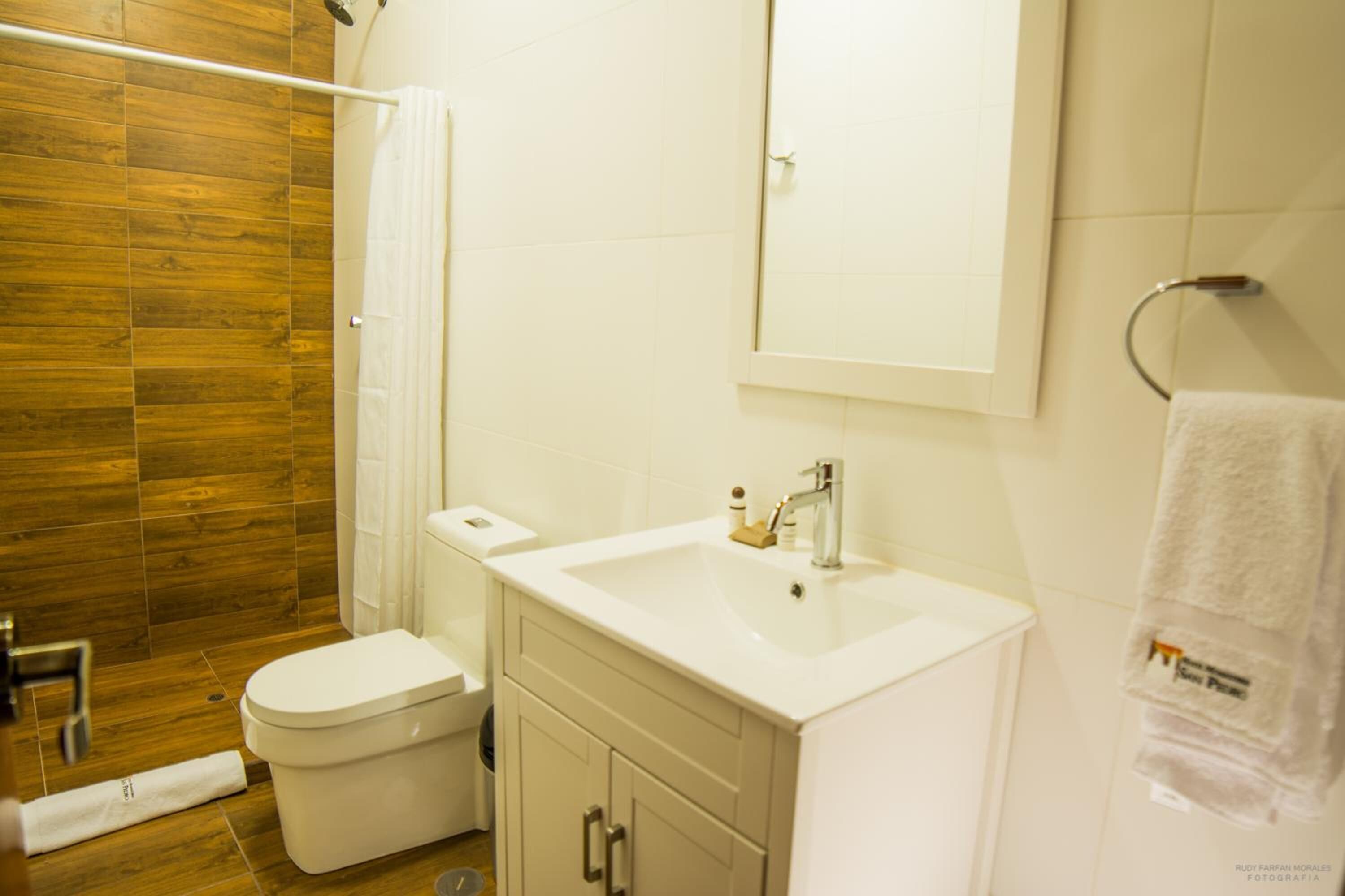 shower, free toiletries, bathrobes, towels