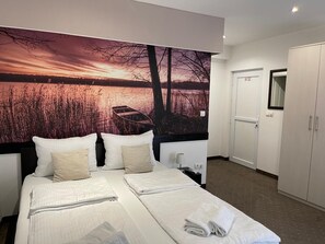 Desk, blackout drapes, soundproofing, iron/ironing board