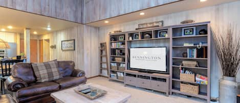 Flat-screen TV, fireplace, video games, DVD player