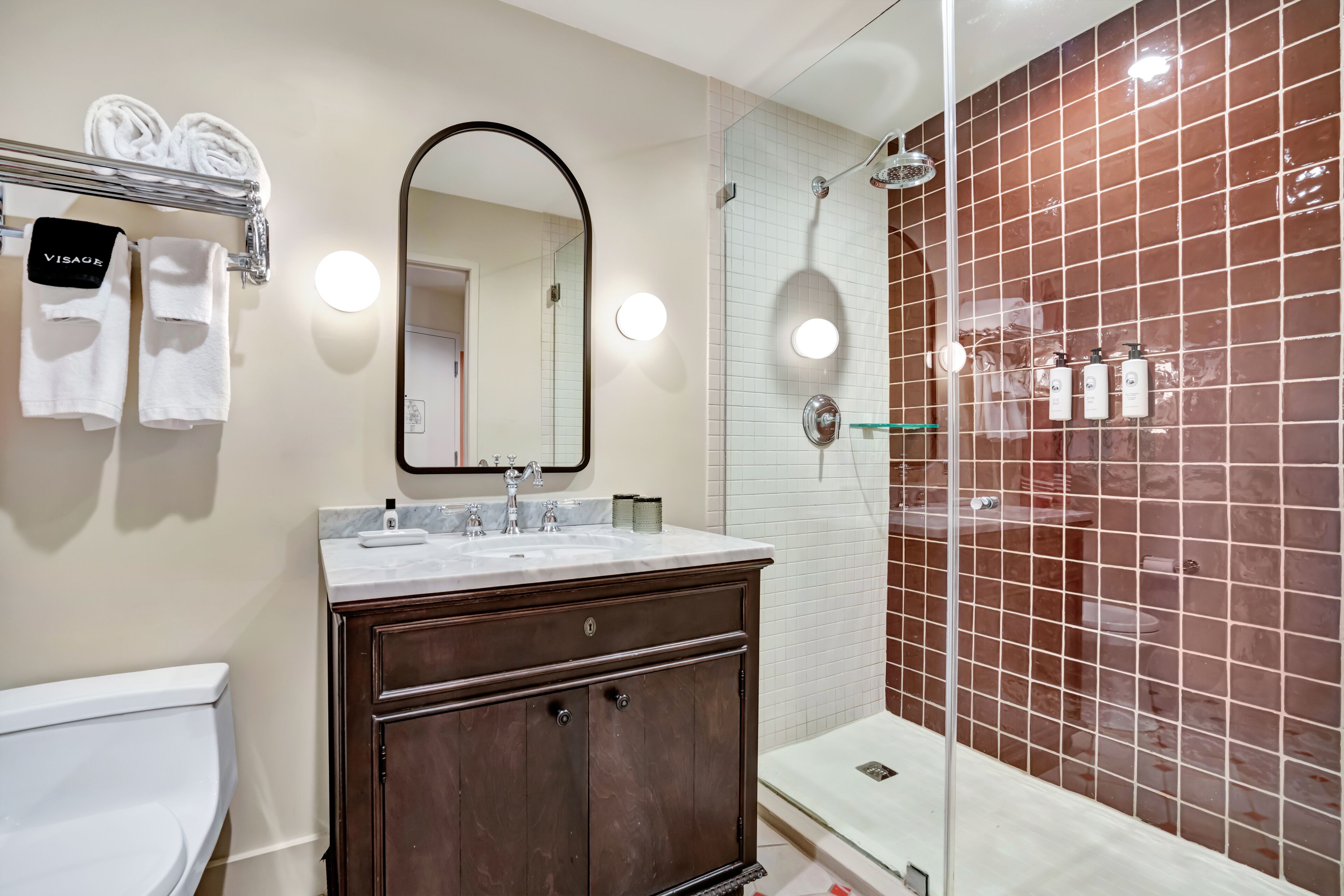 rainfall showerhead, designer toiletries, hair dryer, bathrobes