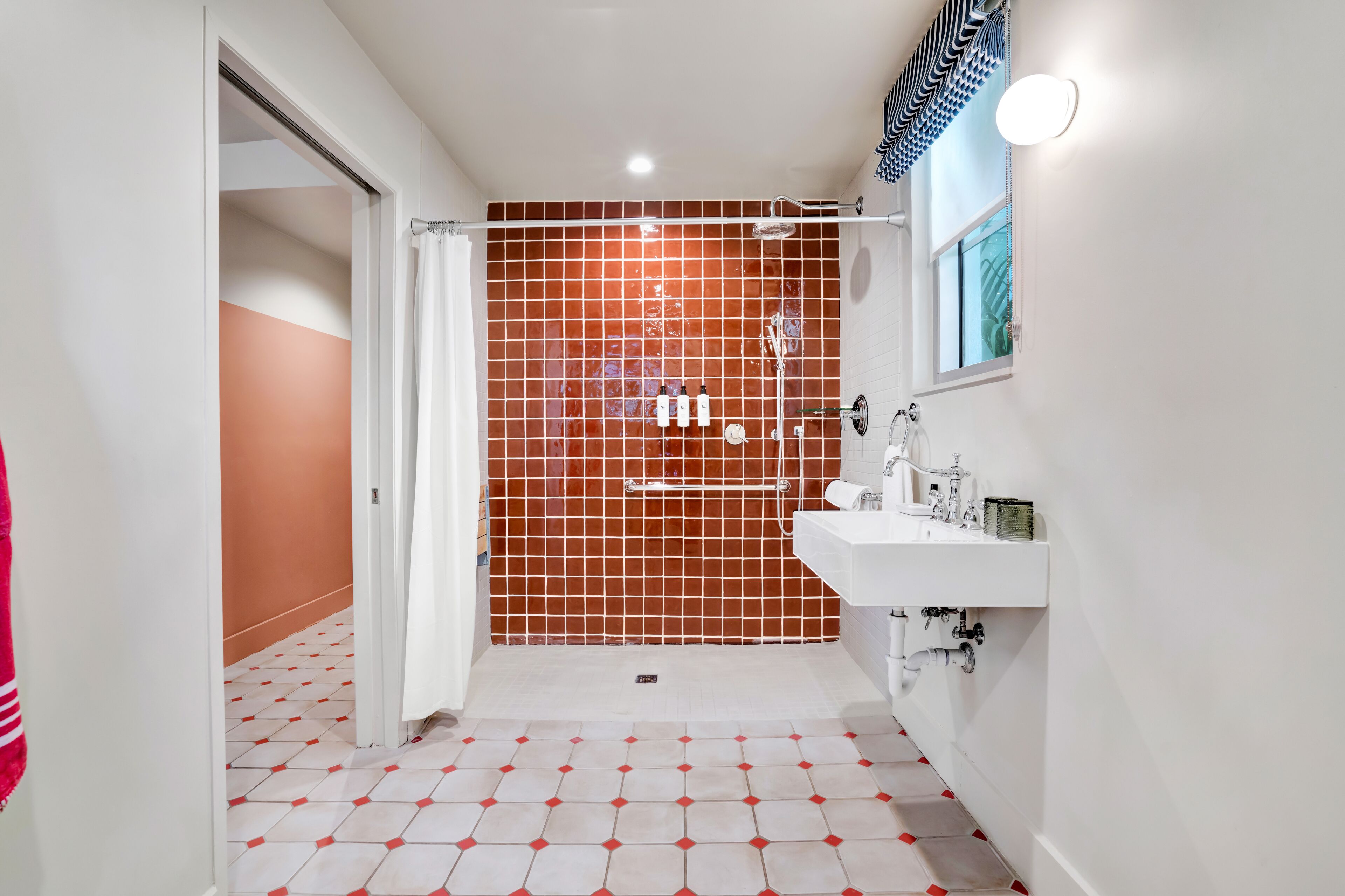 deluxe studio, 1 king bed | bathroom | rainfall showerhead, designer toiletries, hair dryer, bathrobes