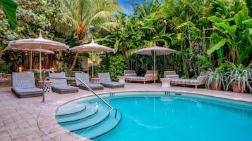 Outdoor pool, open 7:00 AM to 10:00 PM, pool umbrellas, sun loungers