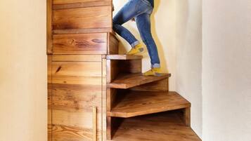 Staircase features a unique, integrated design with visible grain patterns.