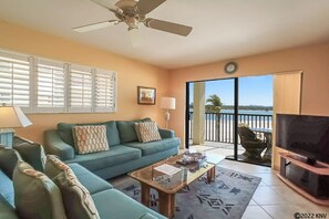 Living area - Fabulous Beachfront Corner Condo at Carlos Pointe Resort w/ Million$ Gulf View! Heated Pool! (Fort Myers Beach)