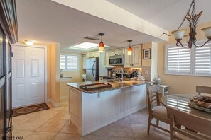 Private kitchen - Fabulous Beachfront Corner Condo at Carlos Pointe Resort w/ Million$ Gulf View! Heated Pool! (Fort Myers Beach)