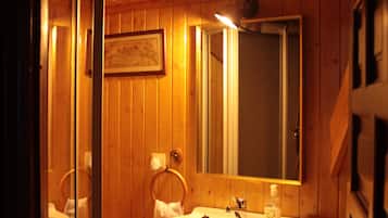 Bathtub, hair dryer, bidet, towels