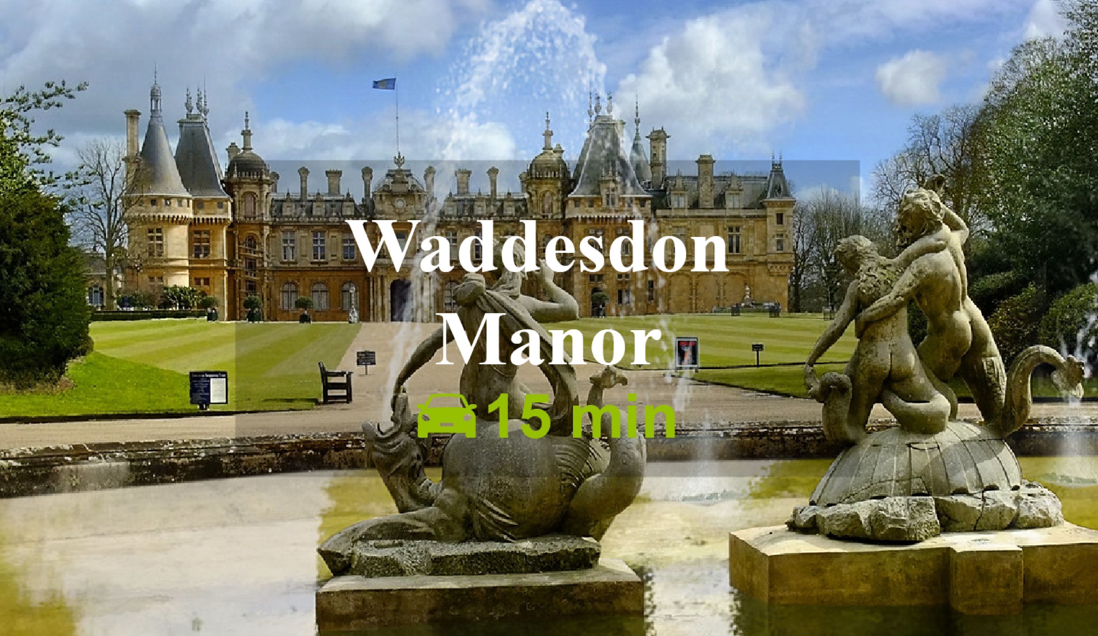 Manor de Waddesdon con una gran fuente y estatuas en primer plano.