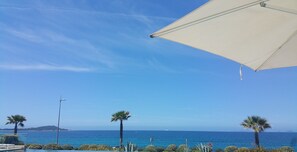 On the beach, beach towels