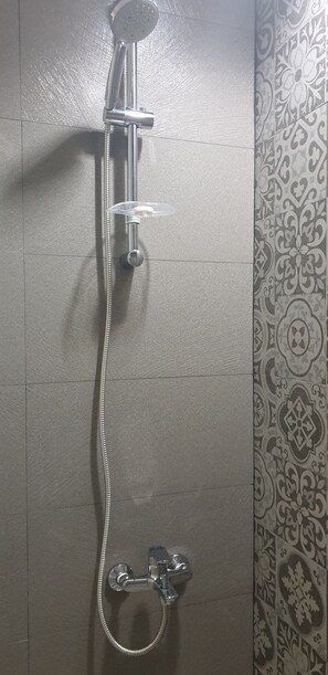 Hair dryer, towels, soap, shampoo