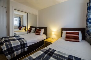 2 dormitorios, tabla de planchar con plancha, wifi y ropa de cama