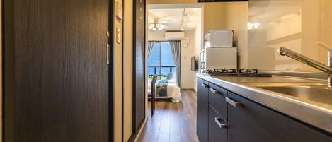 Desk, blackout curtains, soundproofing, iron/ironing board