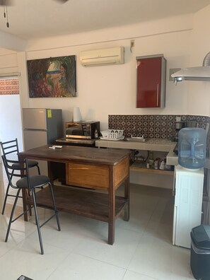 Fridge, microwave, stovetop, coffee/tea maker
