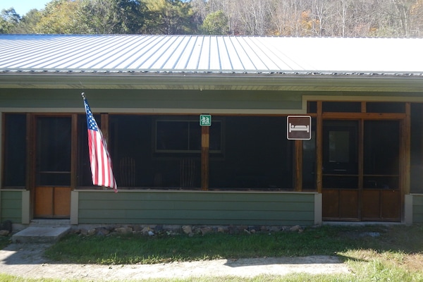 Front view of home with screened porch