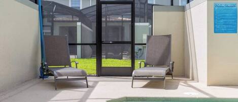 Outdoor pool, a heated pool, pool loungers