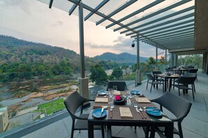 Breakfast, lunch served; local and international cuisine, garden views  - Niraamaya Retreats Samroha Athirappilly (Chalakudy)