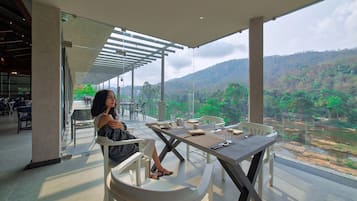 Breakfast, lunch served; local and international cuisine, garden views