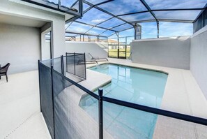 Outdoor pool, a heated pool, pool loungers