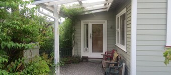 Roa Cottage is a rustic cottage, close to the start of the Paparoa Great walk.