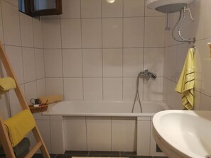 Hair dryer, towels, soap, toilet paper