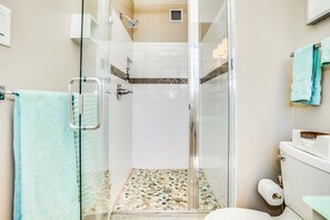 Bathtub, hair dryer, towels, soap