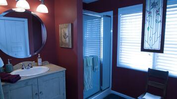 Bathtub, hair dryer, towels, soap