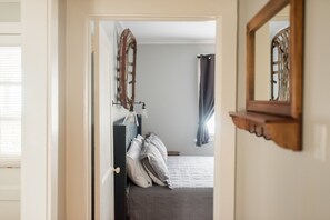 1 bedroom, desk, iron/ironing board, travel crib