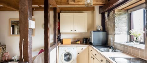 Fridge, microwave, dishwasher, dining tables