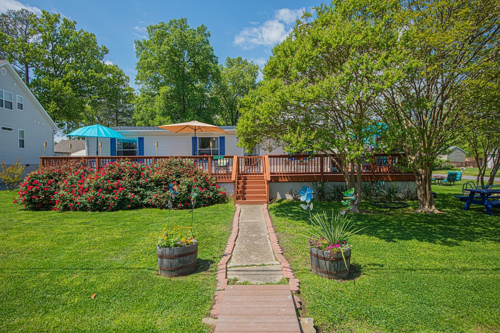 Double tide, 3 BR, water views, spacious lot & deck