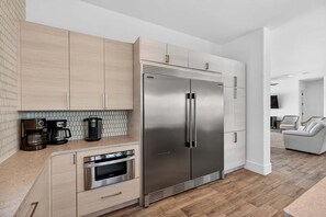 Fridge, microwave, oven, stovetop - The Enclave on 30A - Luxury Home with Massive Pool & Rooftop Deck (Santa Rosa Beach)