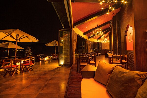 Breakfast, lunch served; local and international cuisine, garden views