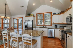 Full-sized fridge, microwave, oven, stovetop - 1289 - Sounds Like Fun, 6-bed 5-bath home in Corolla NC with stunning sound views & ample amenities (Corolla)