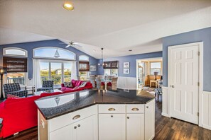 TV, fireplace, books - 1488 - Sandy Pause, 6-bed 5-bath, Corolla, NC, pet friendly, private pool, hot tub, game room (Corolla)