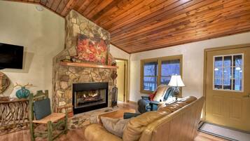 Älytelevisio, takka, kirjoja