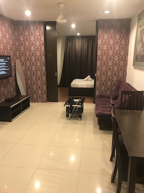 Suíte estúdio superior | Área de estar | Smart TV