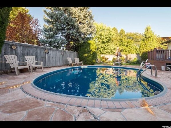 Outdoor pool, a heated pool - Wasatch Front Home Close to EVERYTHING! (Murray)