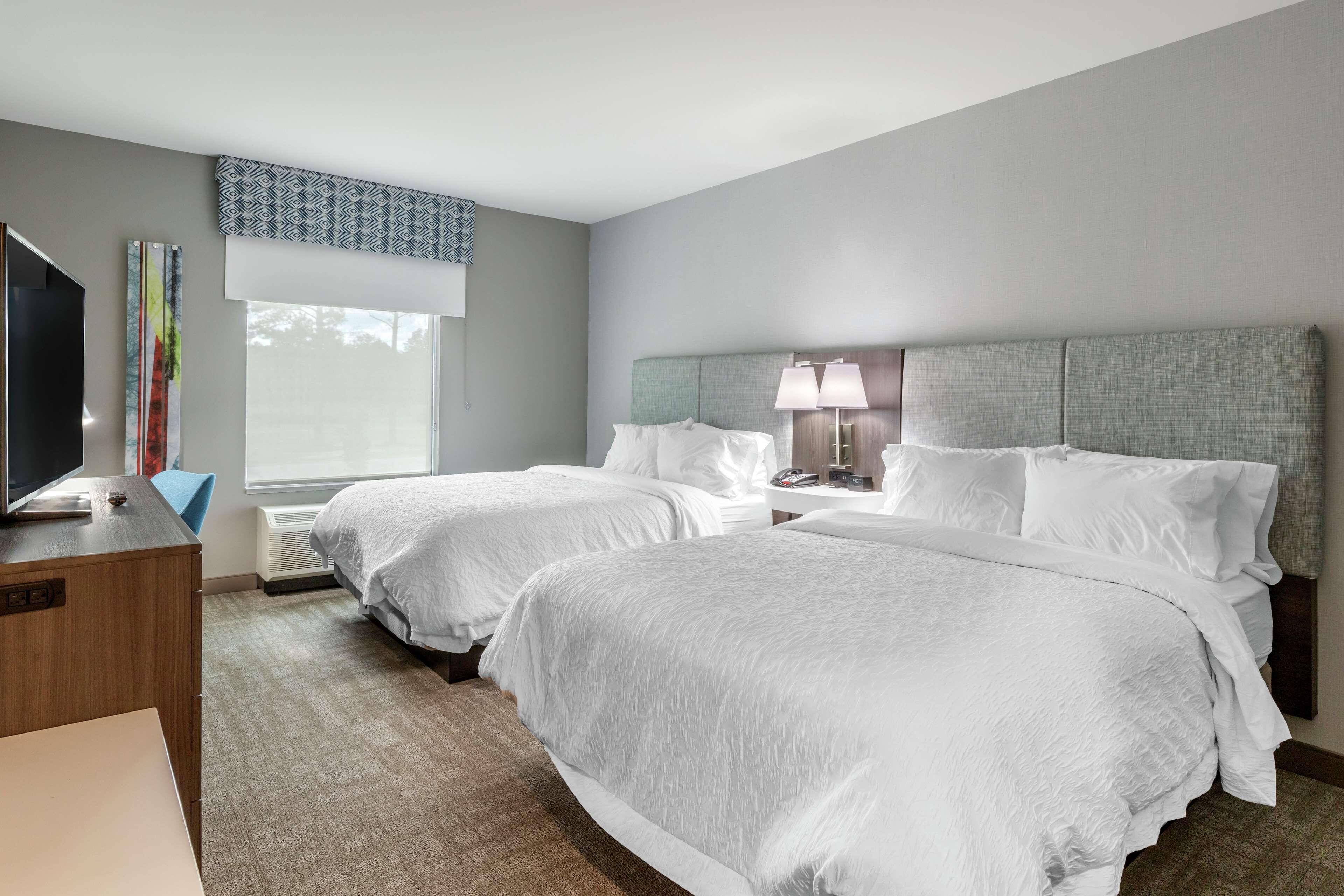 room, 2 queen beds, refrigerator & microwave | in-room safe, desk, blackout curtains, iron/ironing board