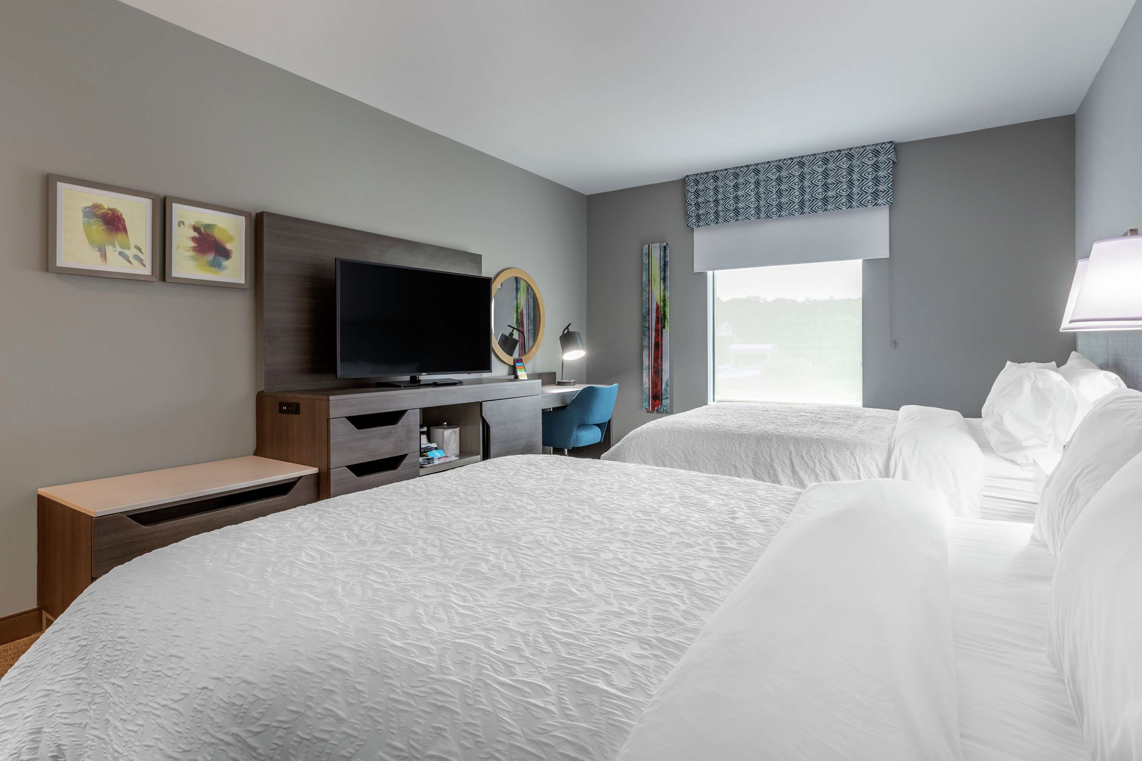 room, 2 queen beds, refrigerator & microwave | in-room safe, desk, blackout curtains, iron/ironing board